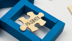Model house made from wooden block and wooden puzzle with text probate on white background