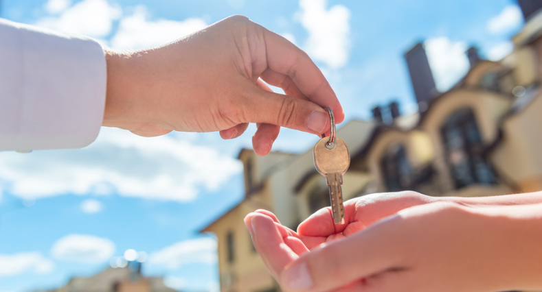 Transfer of a set of keys between the hands of two people
