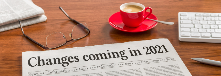 A newspaper on a wooden desk - Changes coming in 2021