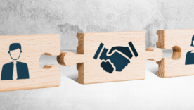 Wooden puzzle with icons of a man, mediator and woman. The concept of the role of a mediator in saving the family, mediation.
