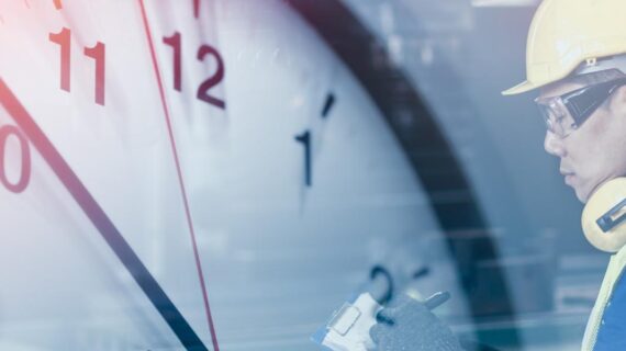 Construction worker looking at checklist with clock overlay for deadline concept