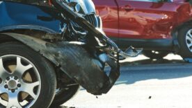 Car crash accident on road. damaged automobiles