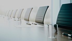 Table with equipment in conference room. Close up. 3D Rendering