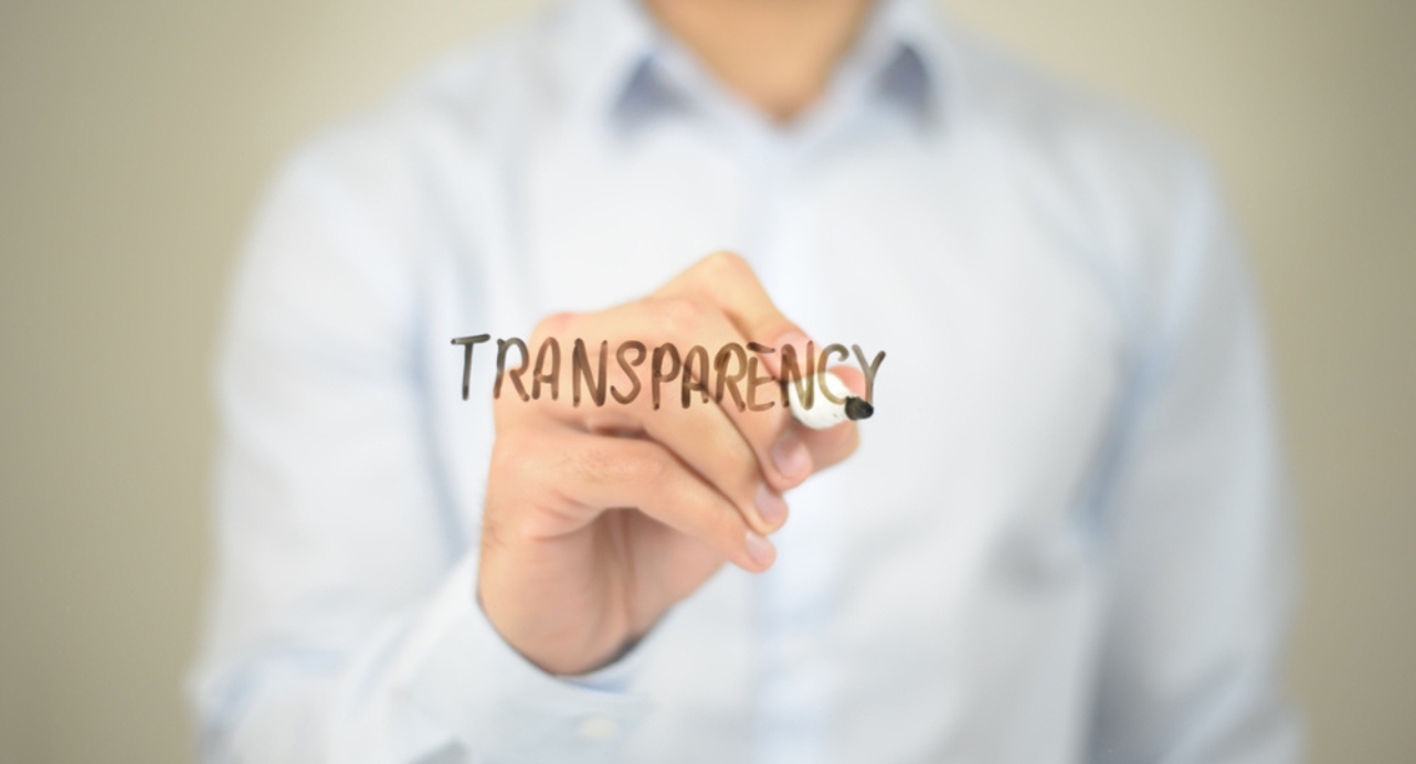 Transparency, Man writing on transparent screen.