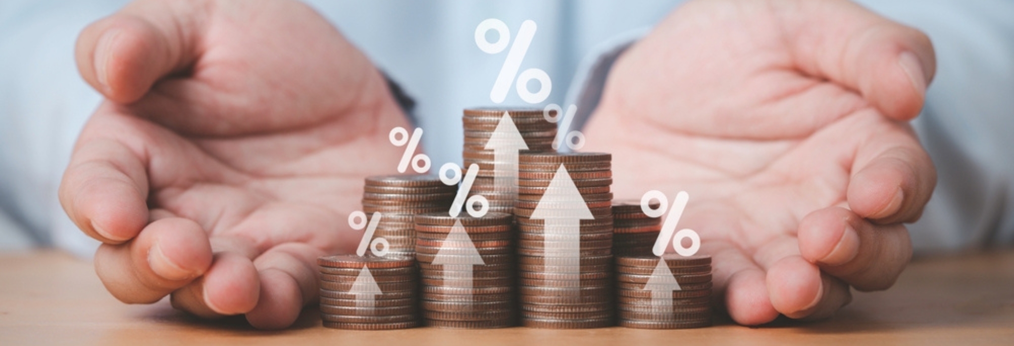 Two hand giving heap of coins money with up arrow and percentage symbol for financial banking increase interest rate or mortgage investment dividend from business growth concept..