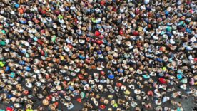 Aerial view of a large crowd gathered on a street