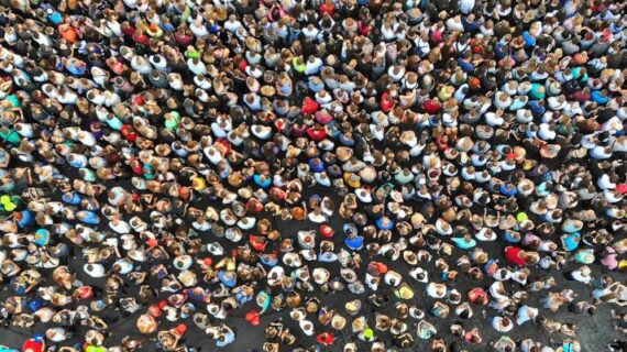 Aerial view of a large crowd gathered on a street