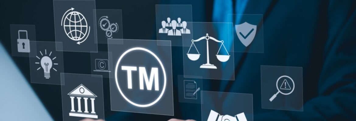 A business professional interacts with digital icons representing trademarks, legal concepts, and intellectual property.