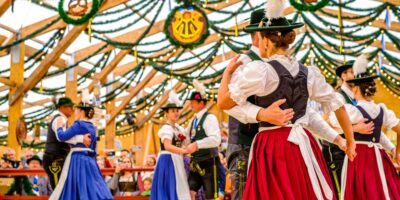 Typical Bavarian traditional dancers in a beertent "Festzelt Tradition" at the Oktoberfest in Munich
