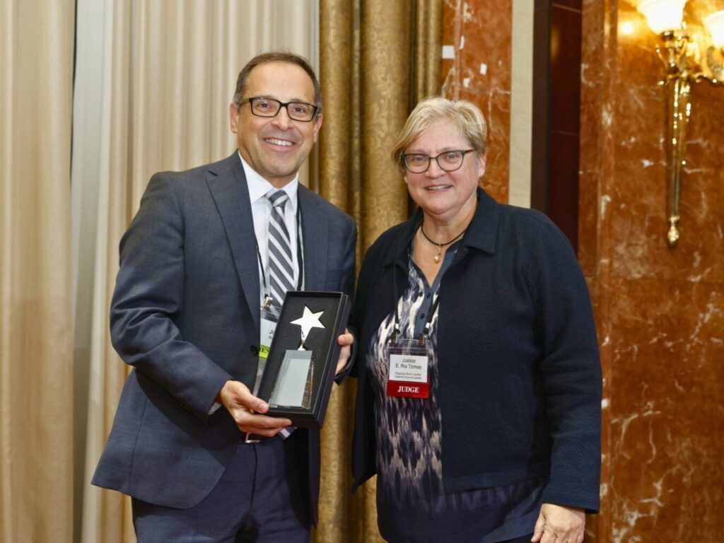 John Russo and The Honourable E. Ria Tzimas