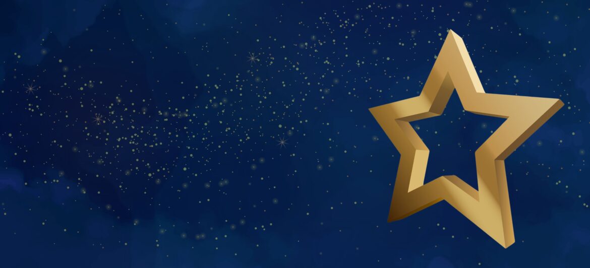 Gold star on a blue background with muted gold glitter to depict award concept