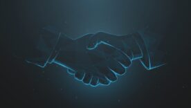 A digital handshake graphic, composed of geometric shapes and glowing blue lines, symbolizing agreement and partnership.