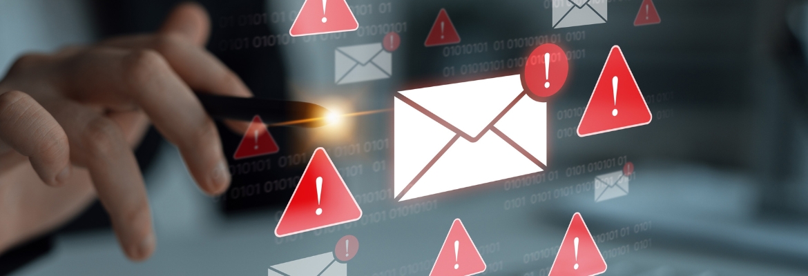 Hands in front of a keyboard with danger alert symbols in the foreground - concept of a cybersecurity warning for unsafe email communication