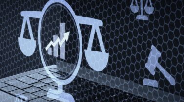 Digital Trade and Market Law Concept with Scales of Justice and Growth Graph on Laptop Background