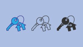 Three keychains with key rings and pendant houses locket